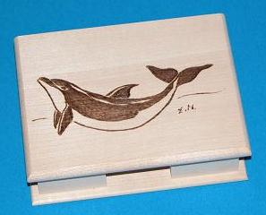Zettelbox mit springendem Delfin