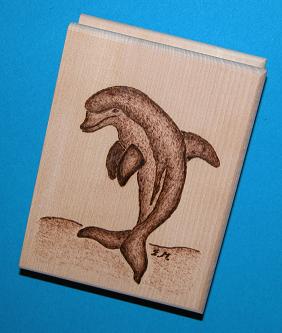Zettelbox mit springendem Delfin